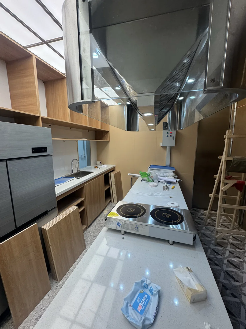 The empty PANNONIA café kitchen with its equipment installed before opening